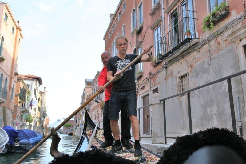 Gondolier Ettore ltry to learn Mr James Bond how to do... Gondolier Ettore ltry to learn Mr James Bond how to do...in Venice canal