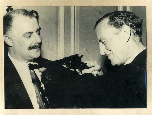       Geoffrey Boothroyd  and   Ian Fleming 